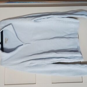 Light blue sweater half zip up with the v-neck